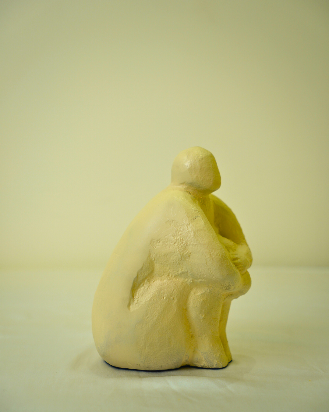 Abstract Seated Human Figurine