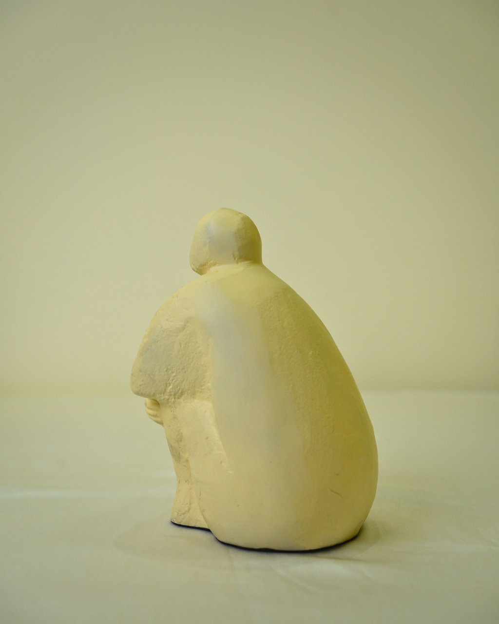 Abstract Seated Human Figurine