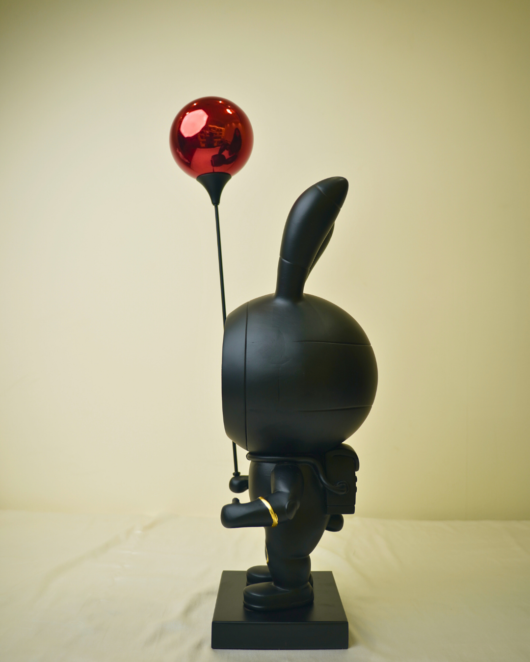 Cosmic Traveler - Standing Astronaut Figurine with Red Balloon