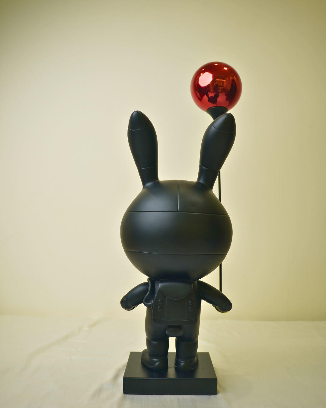 Cosmic Traveler - Standing Astronaut Figurine with Red Balloon