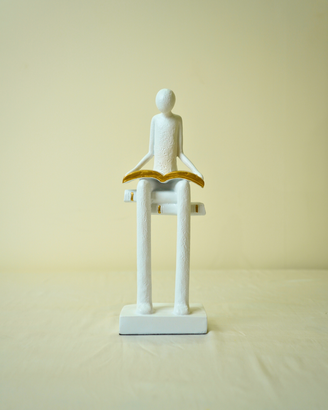 Liber White Reading Man Sculpture