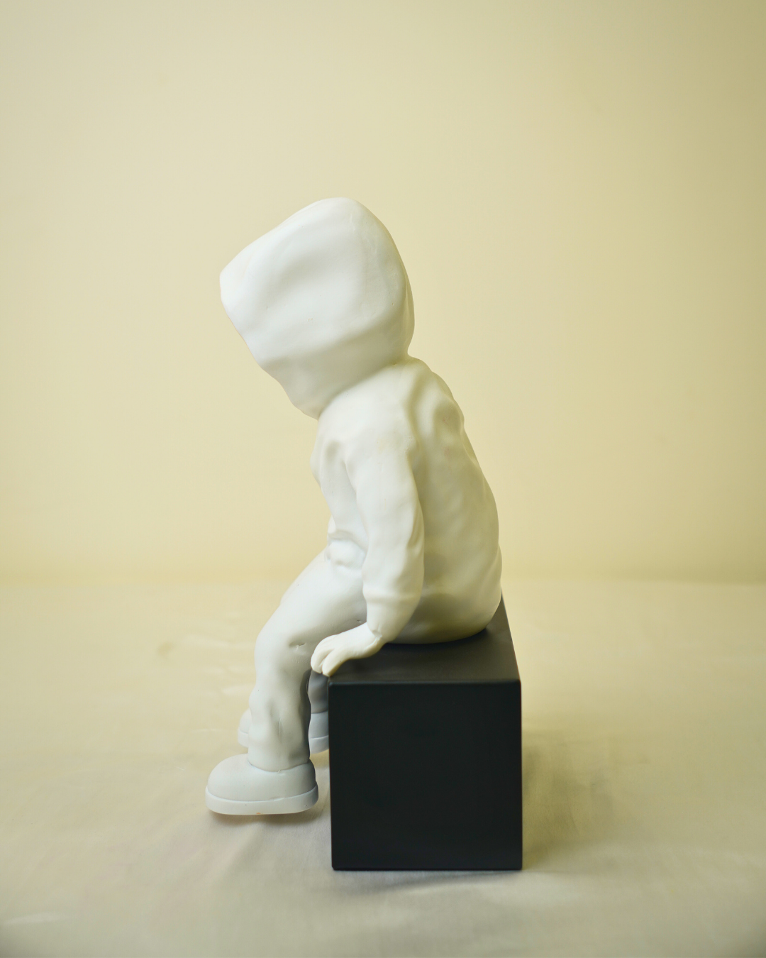 Cool Dude Seated Sculpture in Matte White & Gold