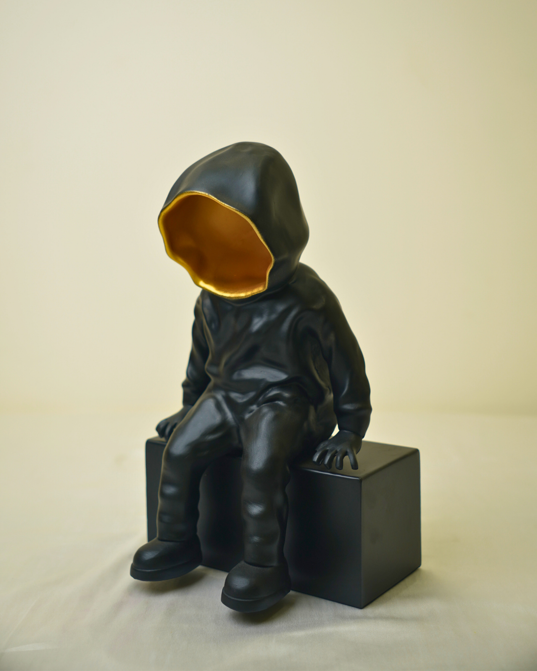 Cool Dude Seated Sculpture in Matte Black & Gold