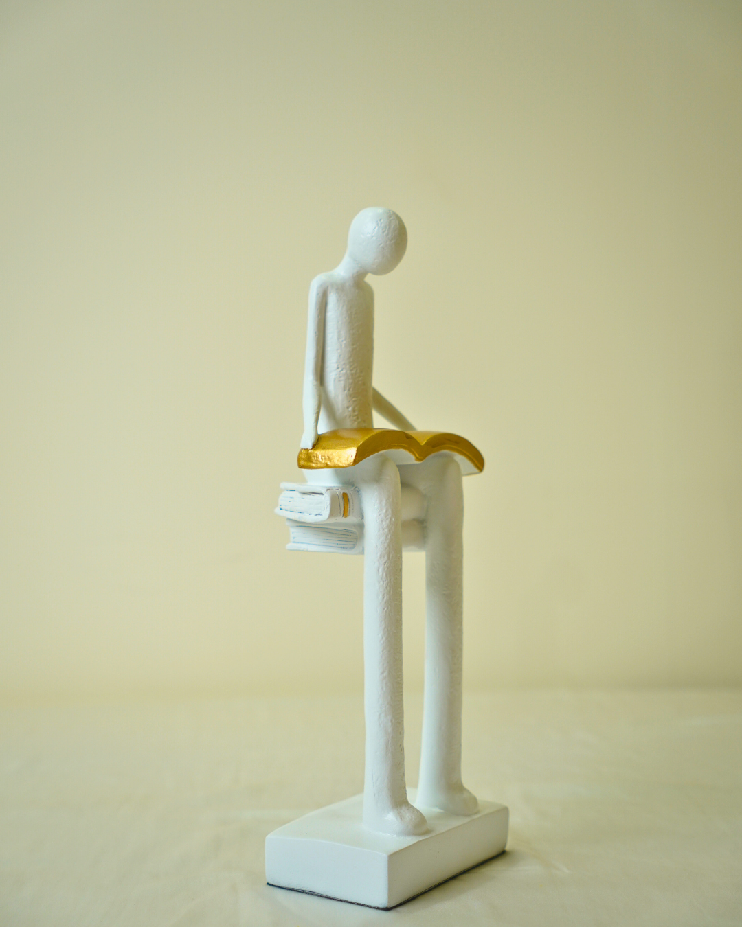 Liber White Reading Man Sculpture