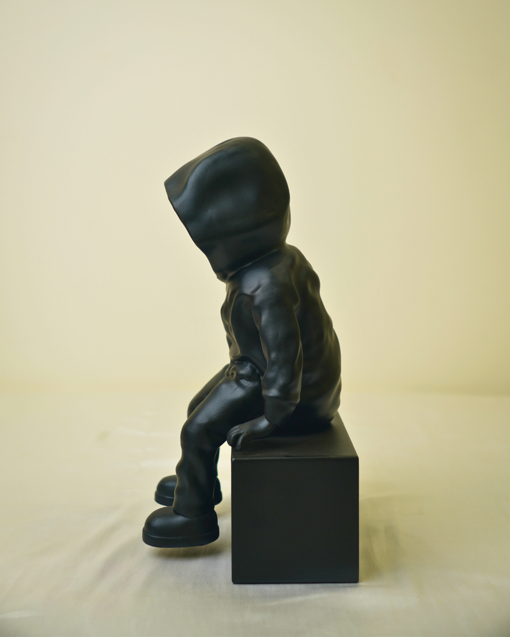 Cool Dude Seated Sculpture in Matte Black & Gold