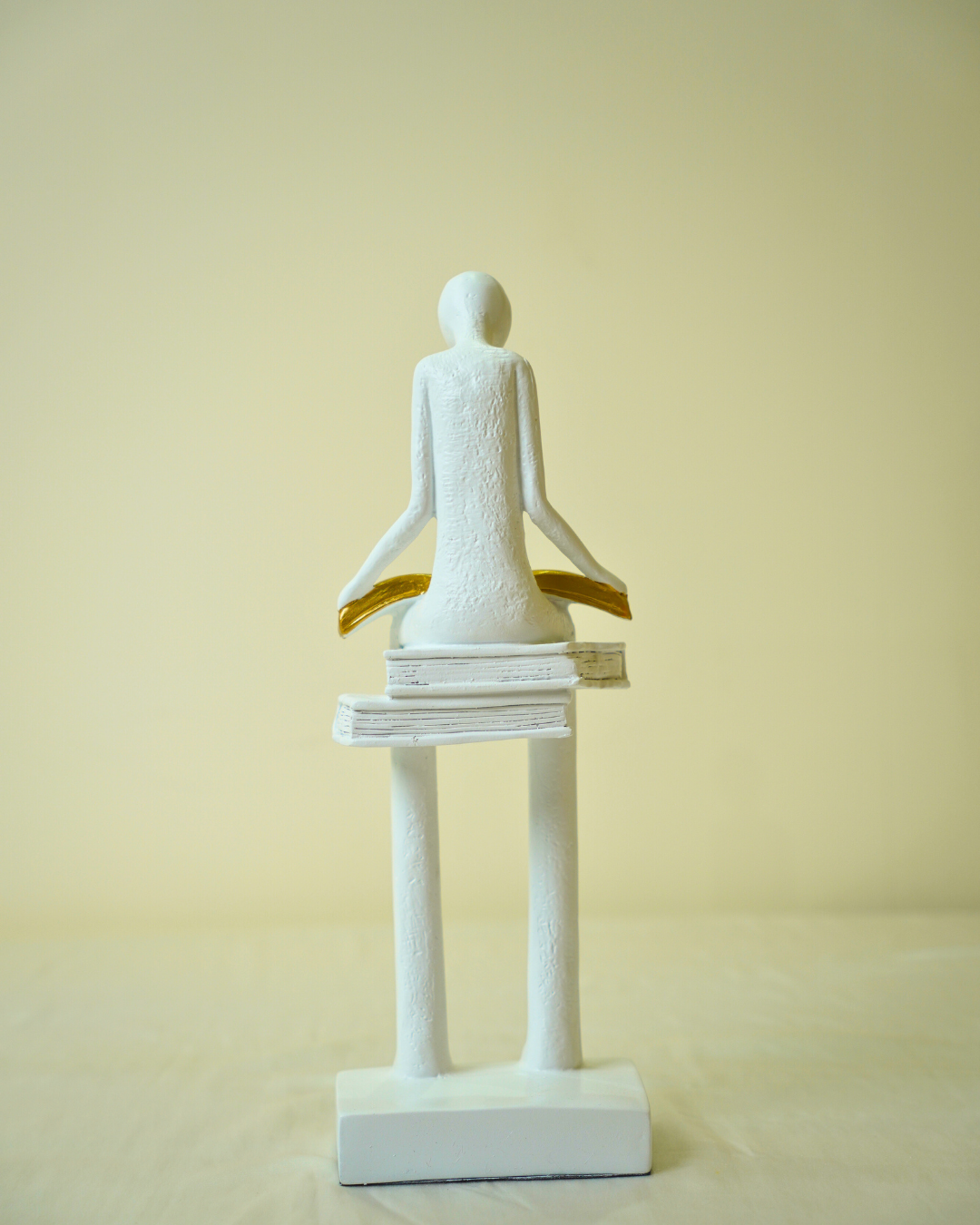 Liber White Reading Man Sculpture