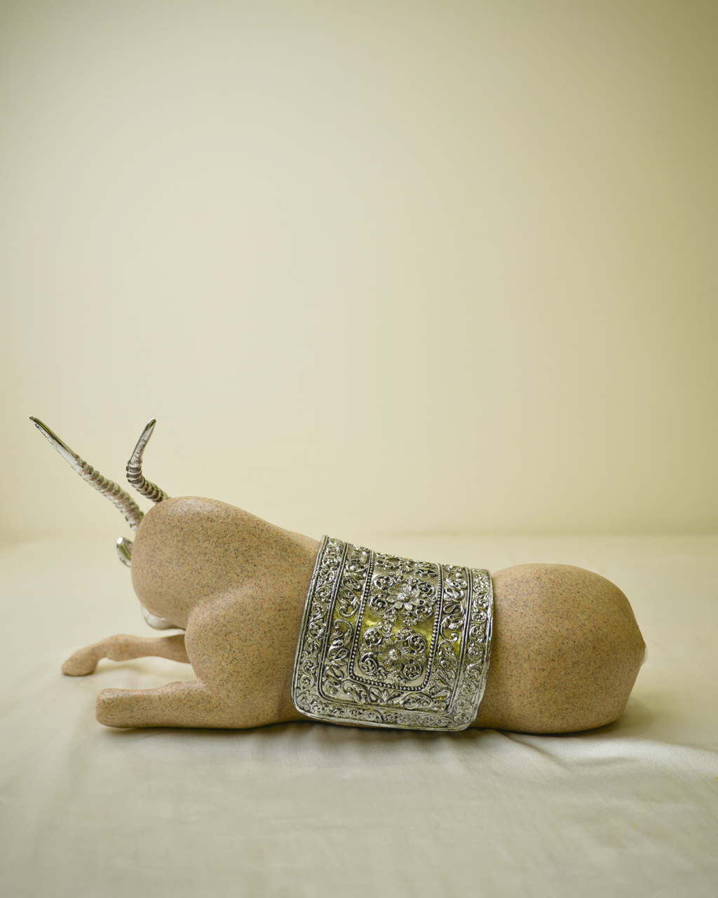Graceful Desert Springbok - Reclining Antelope Figurine with Chrome Accents