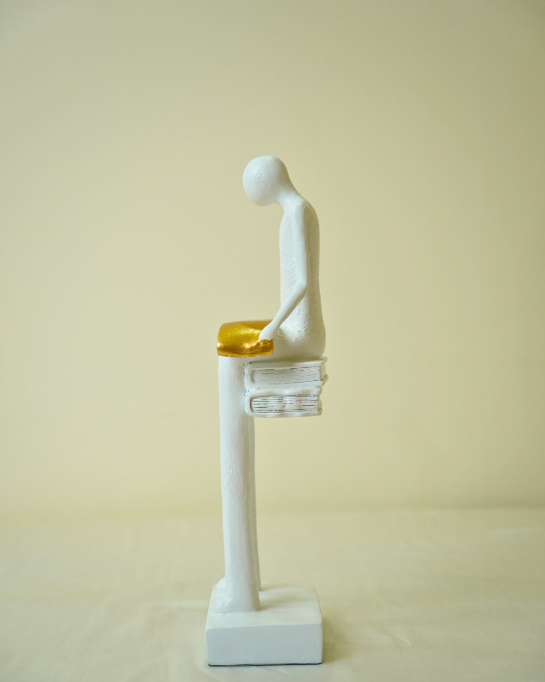 Liber White Reading Man Sculpture