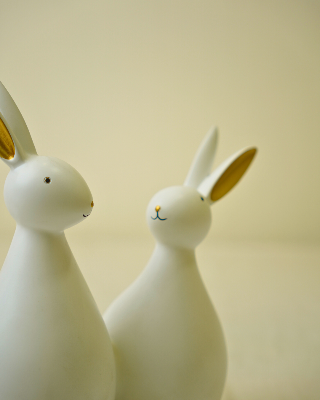 Modern White and Gold Rabbit Duo Hand Painted Decorative Showpiece