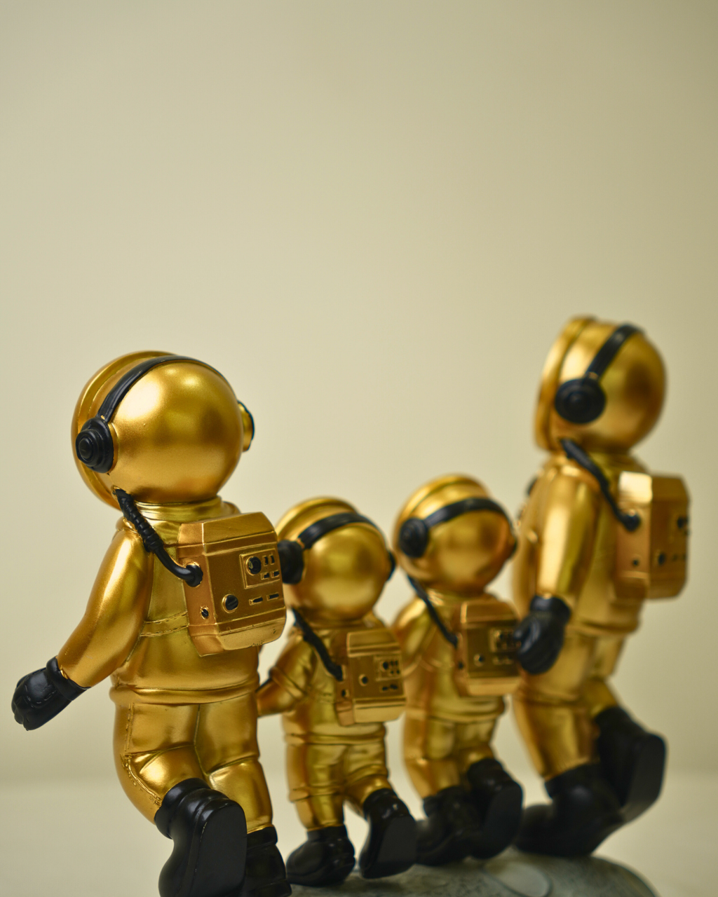 Golden Astronaut Family - Celestial Moon-Walking Luxury Sculpture