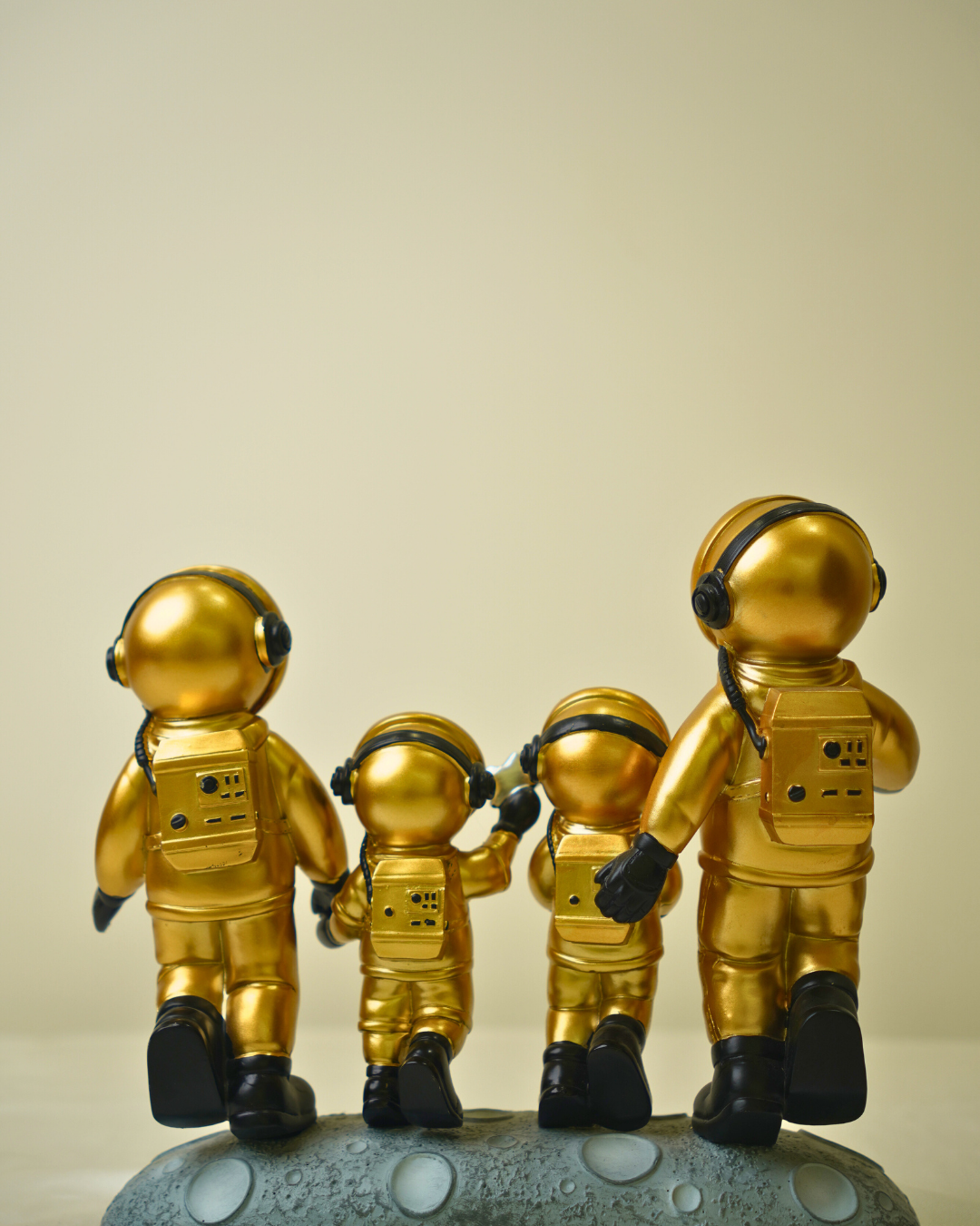 Golden Astronaut Family - Celestial Moon-Walking Luxury Sculpture
