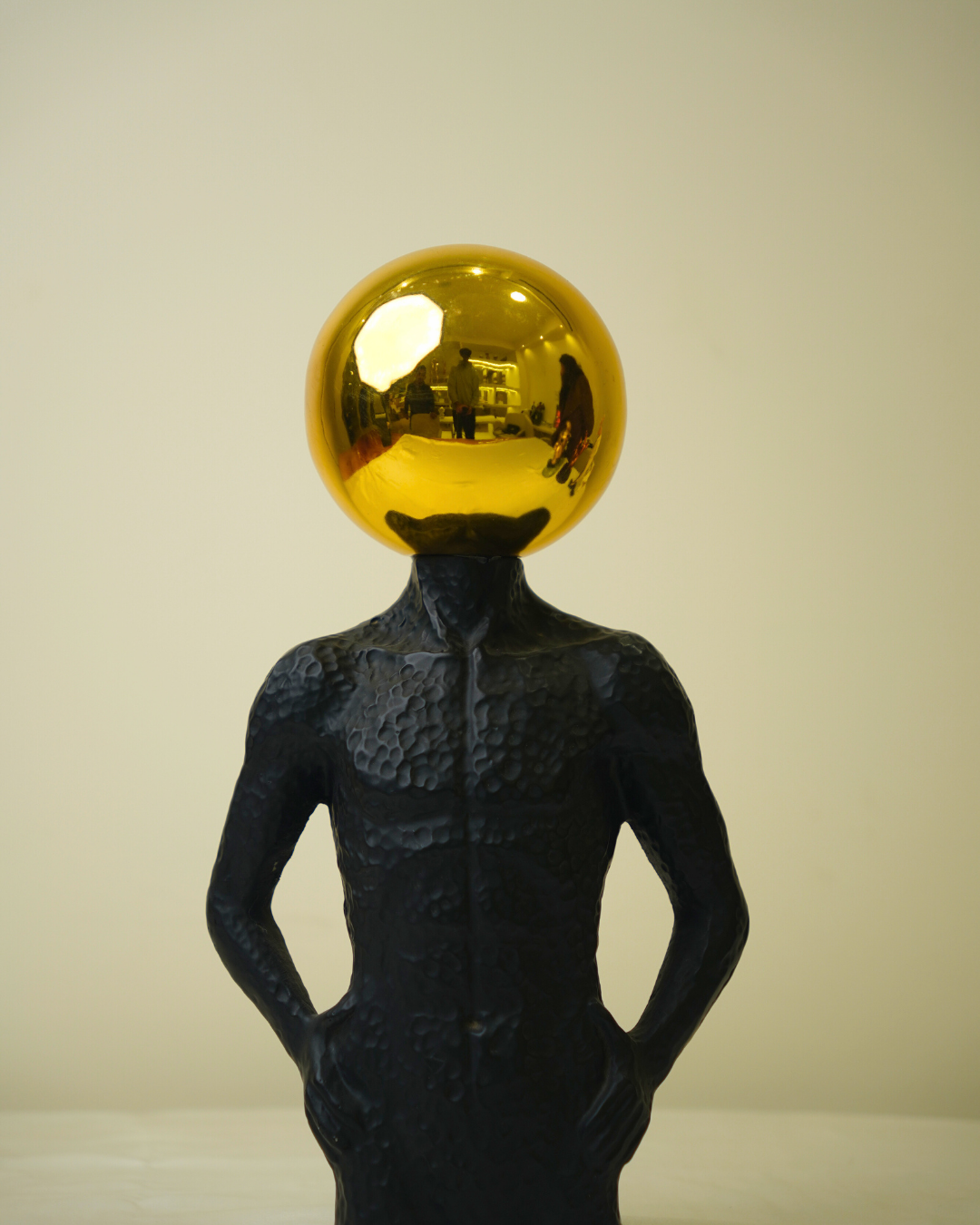 Modern Muscle Craft Accent - Surrealist Figurine with Golden Sphere