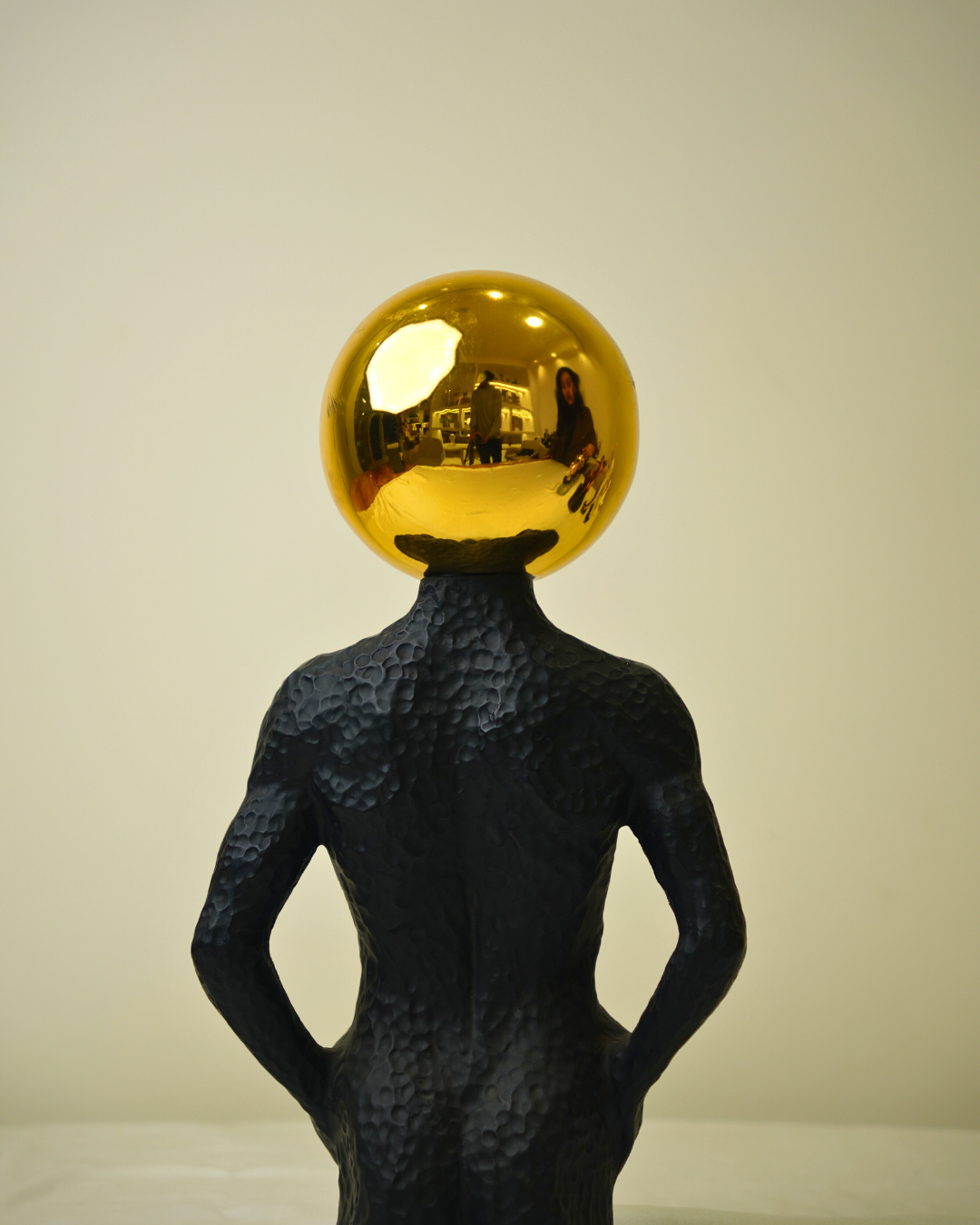 Modern Muscle Craft Accent - Surrealist Figurine with Golden Sphere