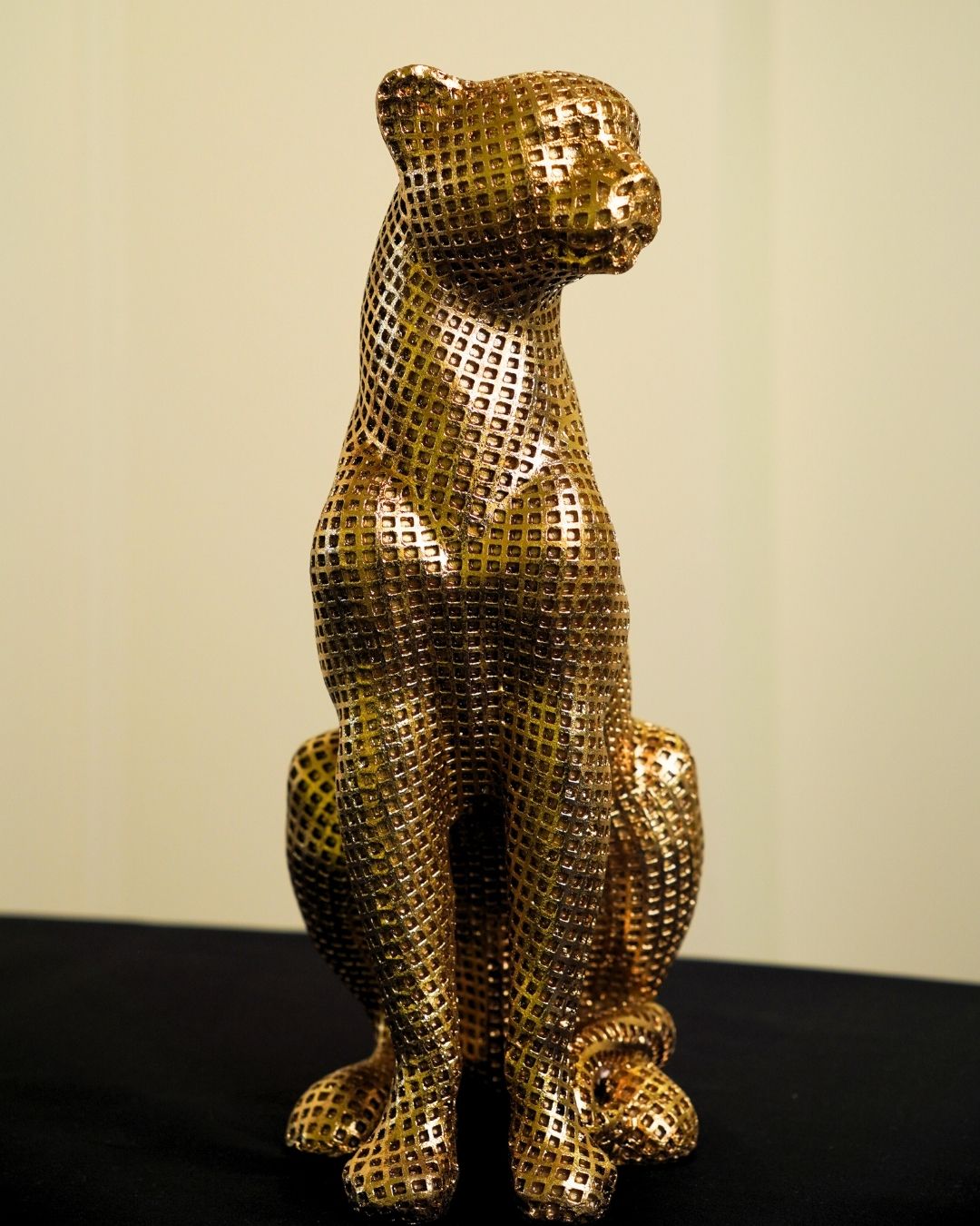 Golden Sitting Leopard