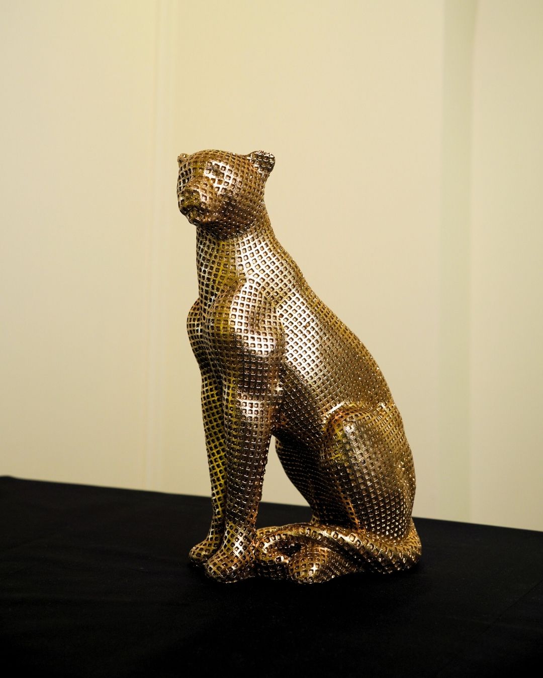 Golden Sitting Leopard