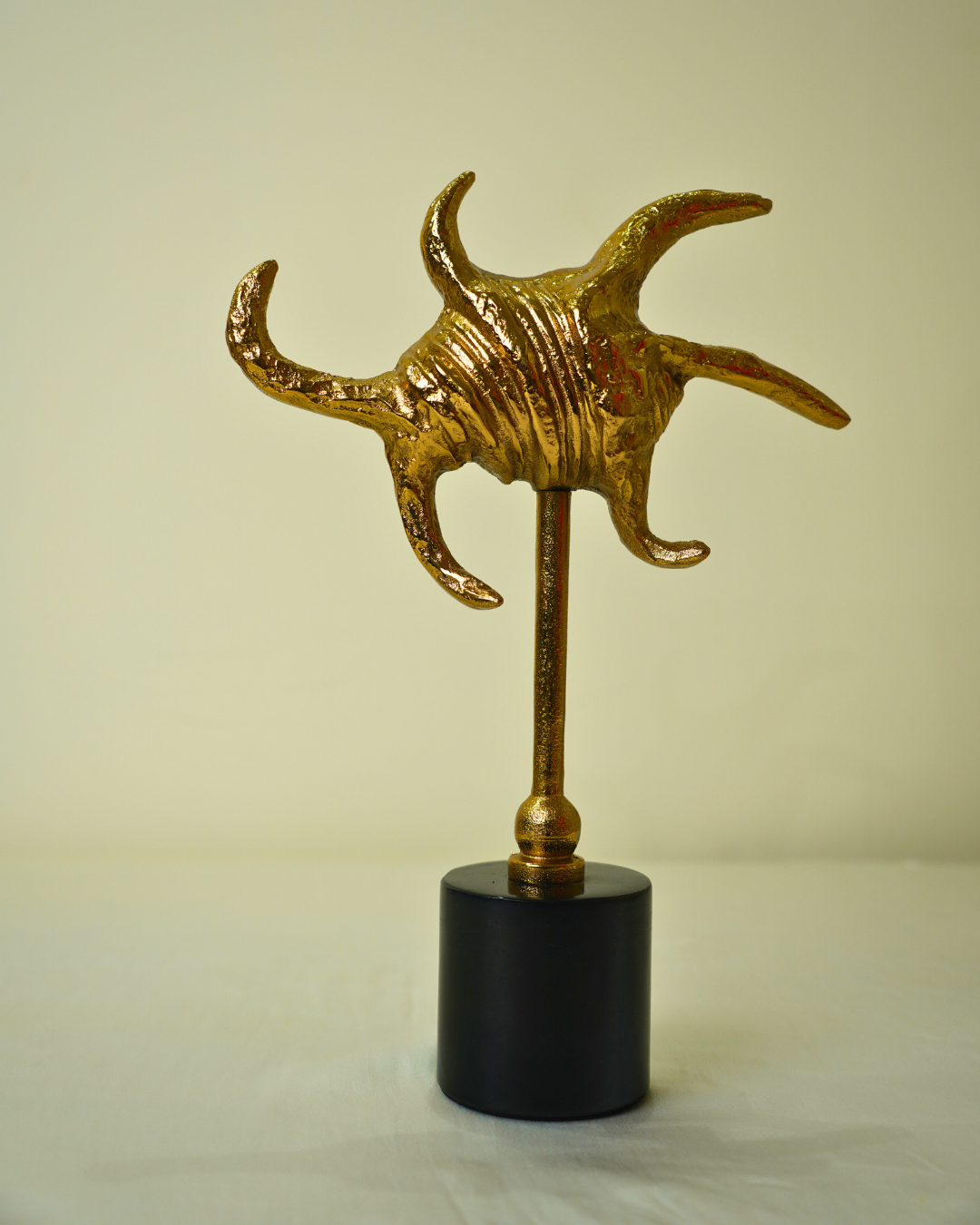 Abstract Golden Metal Sculpture with Black Marble Base