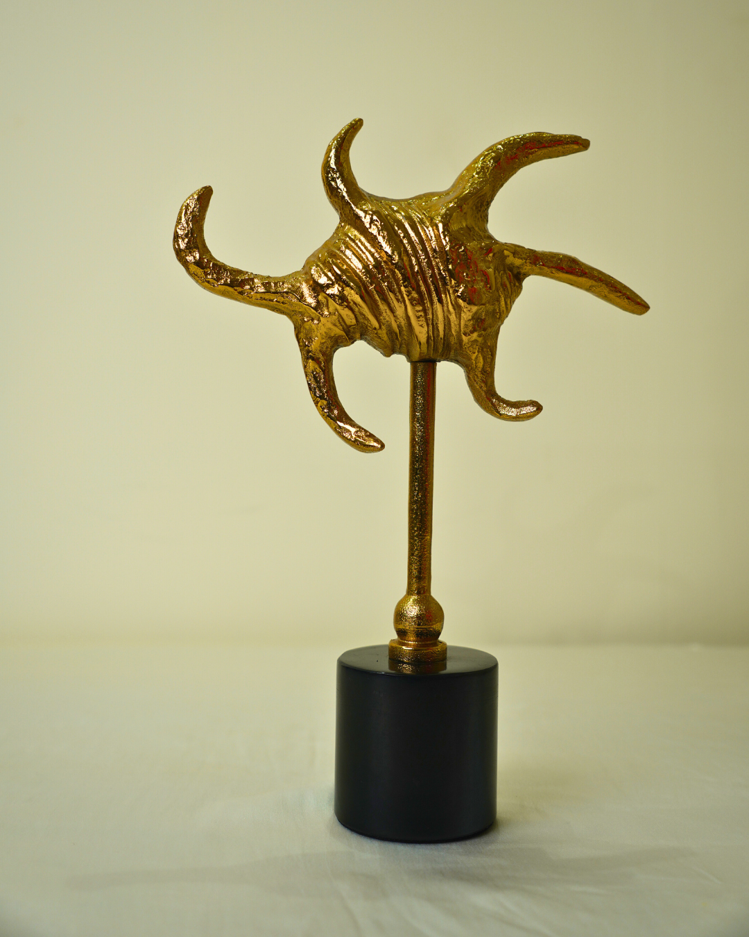 Abstract Golden Metal Sculpture with Black Marble Base
