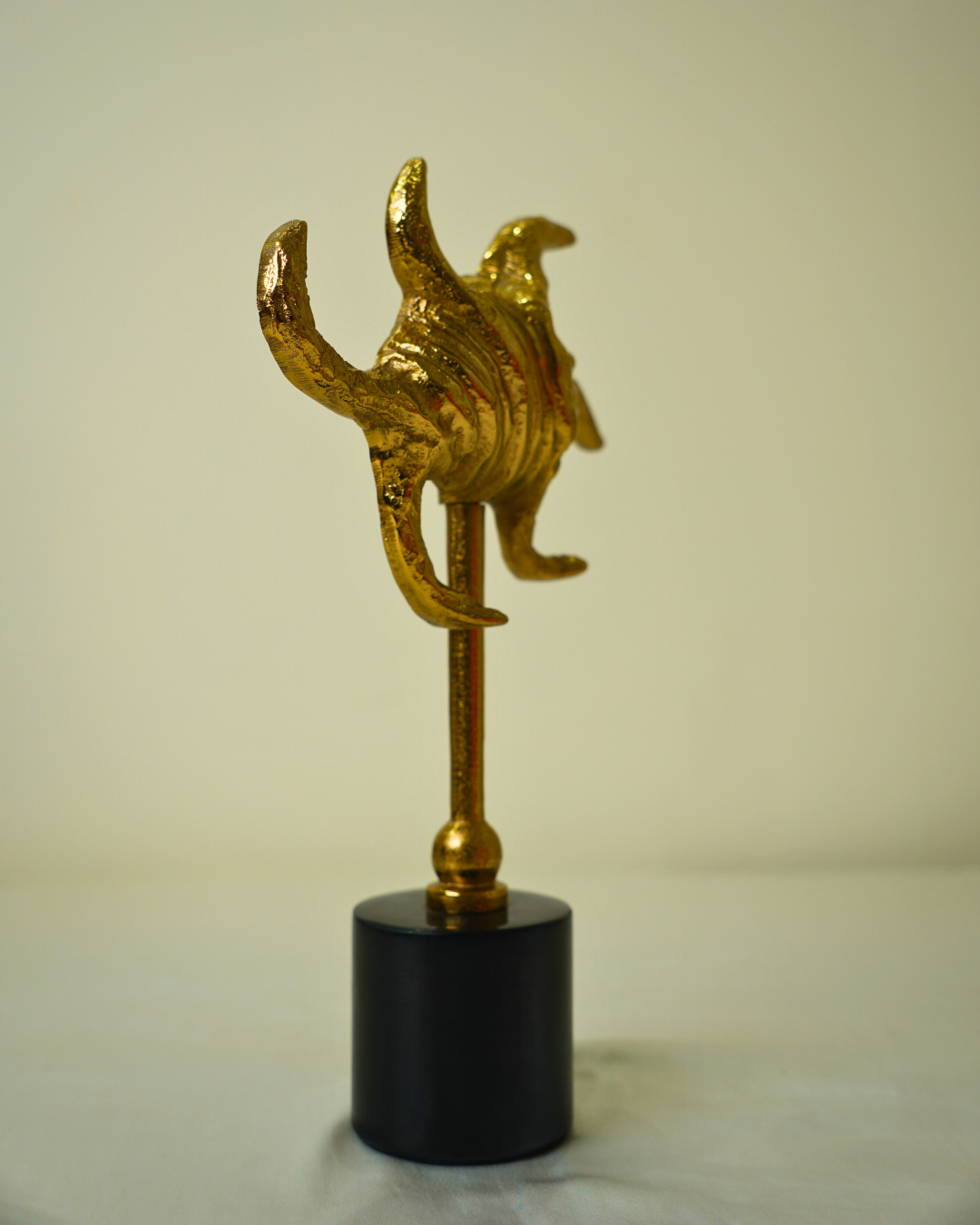 Abstract Golden Metal Sculpture with Black Marble Base