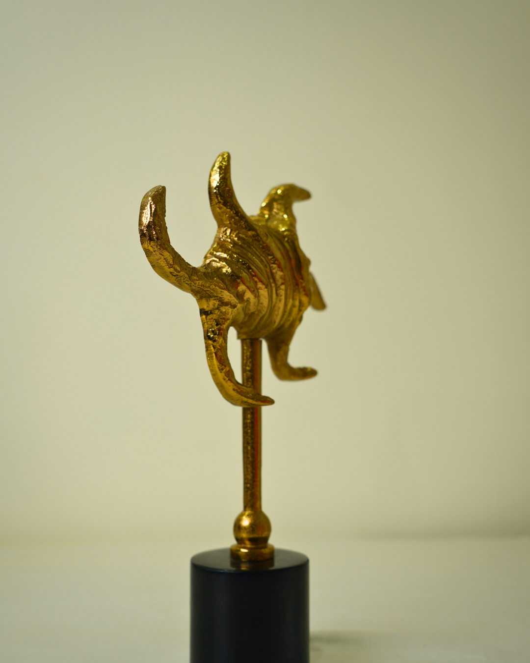 Abstract Golden Metal Sculpture with Black Marble Base