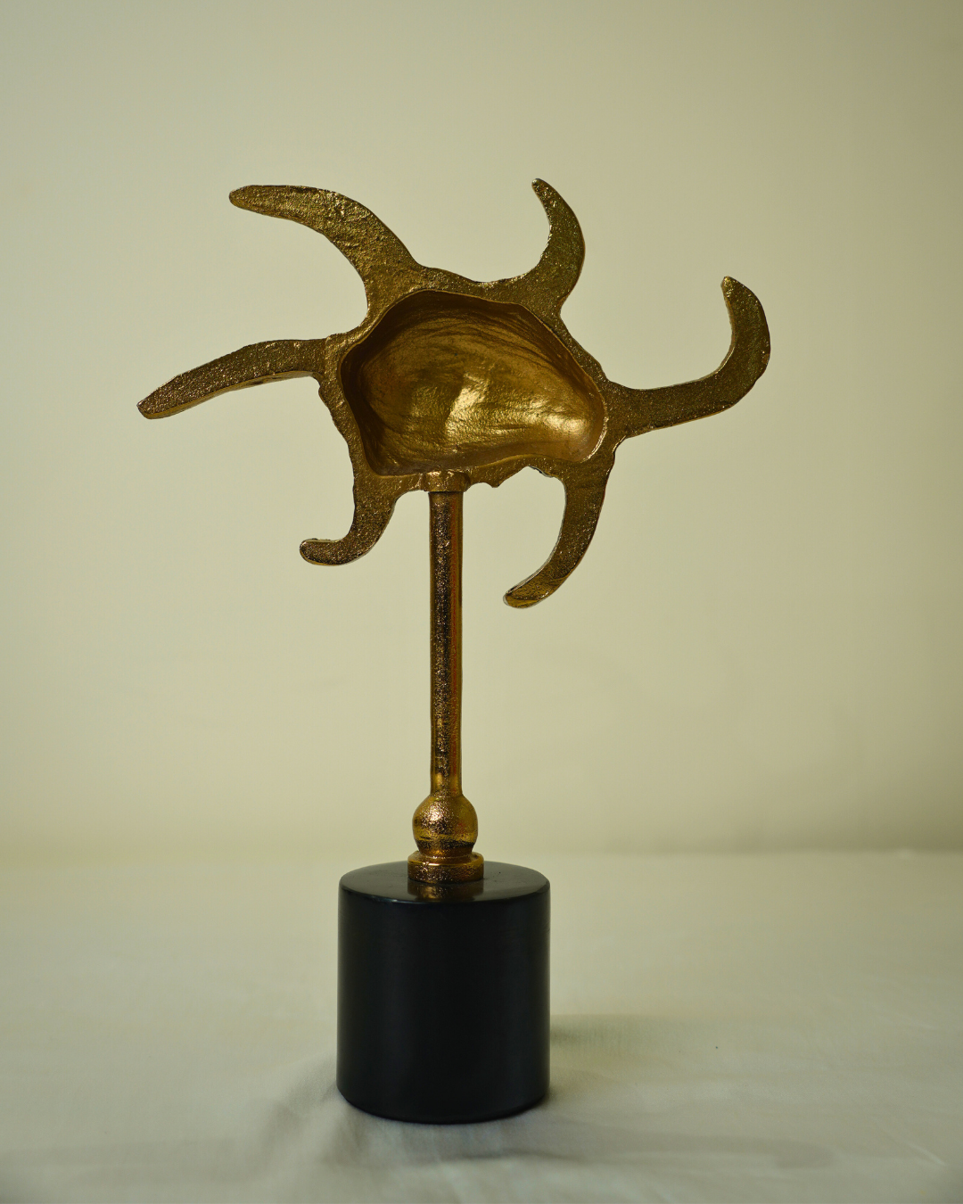 Abstract Golden Metal Sculpture with Black Marble Base